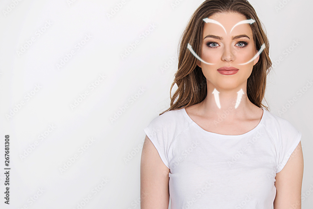 how to apply face cream on your face, beauty concept, beautiful model on white with arrows direction how to apply face cream on your face, beauty concept, beautiful model on white with arrows direction