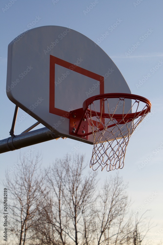 basketball hoop against Fall sky