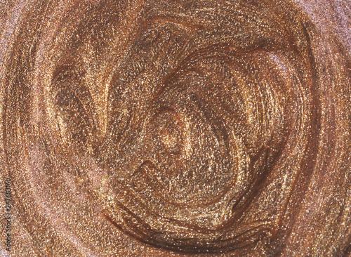 Golden glitter nail polish background