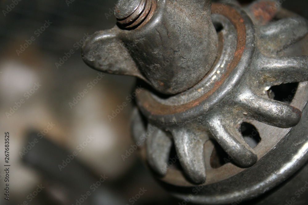 Old rusty cast iron meat grinder close up.JPG