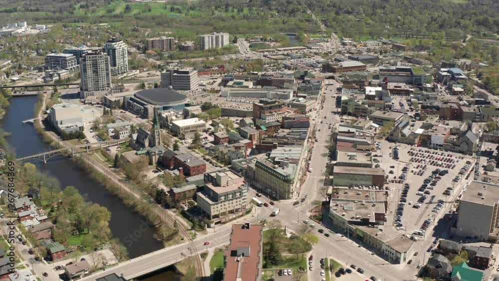 Guelph Ontario Canada 4k Aerial Drone Zoom Out of Downtown Wydnham Street and Surrounding Area, River and Cityscape. Shot Above the Main Part of City During Sunny Day Guelph Ontario Canada 4k Aerial Drone Zoom Out of Downtown Wydnham Street and Surrounding Area, River and Cityscape. Shot Above the Main Part of City During Sunny Day