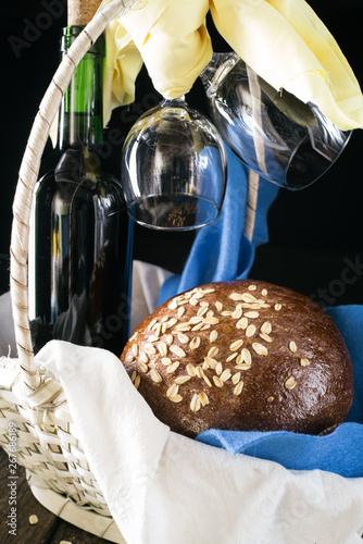 Homemade bread and bottle of wine photo