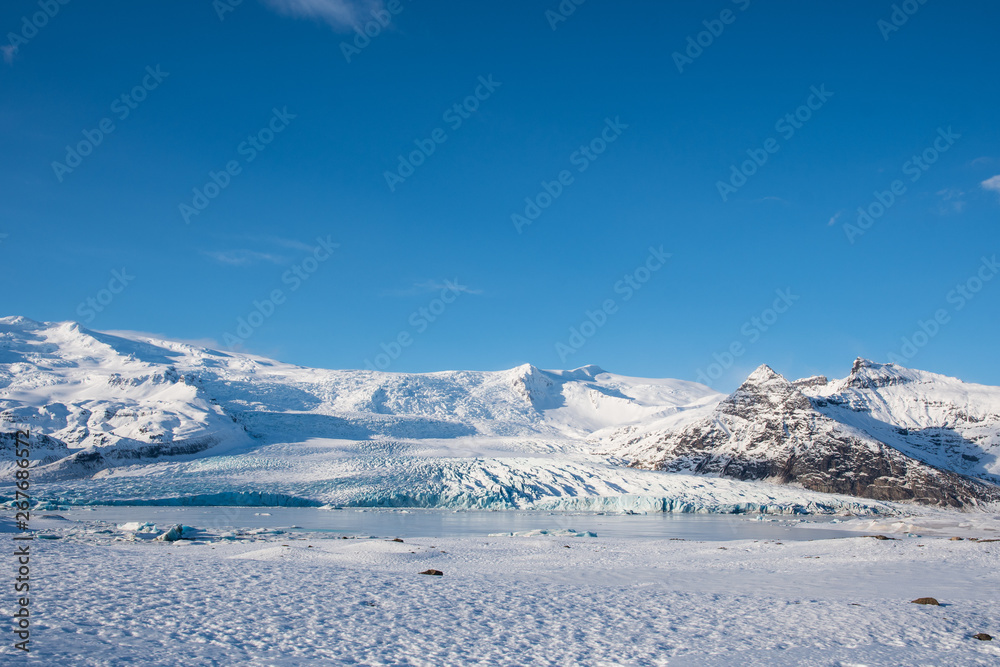 Fjallsarlon Iceberg lagoon with Vatnajokull glacier in Iceland