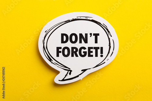 Do not Forget Reminder Speech Bubble Isolated On Yellow Background photo