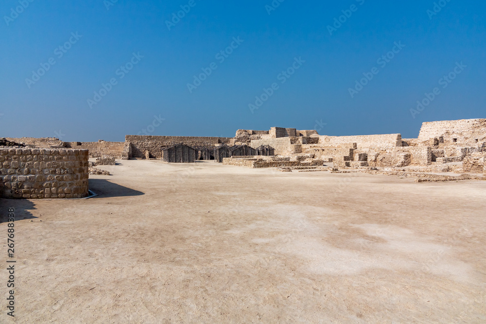 Fort of Bahrain ruin in Manama, Bahrain. Qal'at al-Bahrain Site Museum, UNESCO heritage, panoramic view Fort of Bahrain ruin in Manama, Bahrain. Qal'at al-Bahrain Site Museum, UNESCO heritage, panoramic view