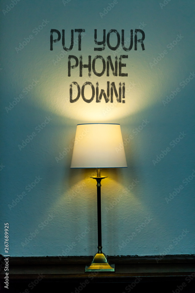 Conceptual hand writing showing Put Your Phone Down. Concept meaning end telephone connection saying goodbye caller