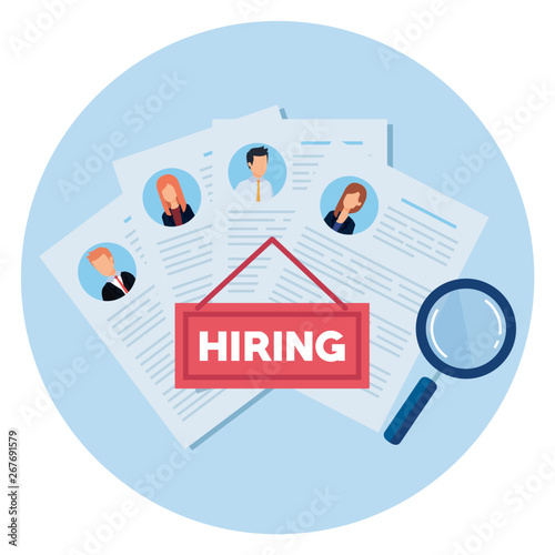 hiring with curriculum vitae and magnifying glass