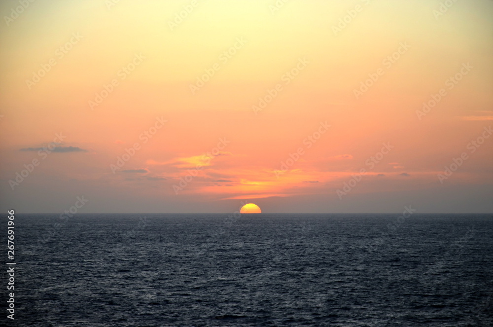 Sunset over Pacific Ocean.