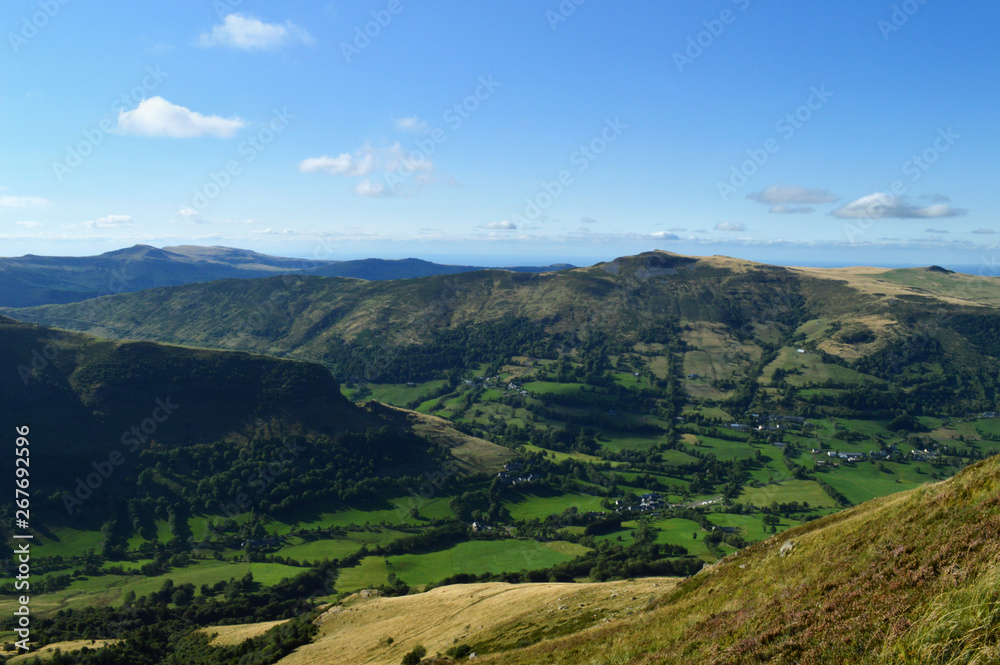 A magnificent panorama and viewpoint from the mountain range of Cantal in Auvergne, France. National Park of the Auvergne volcano