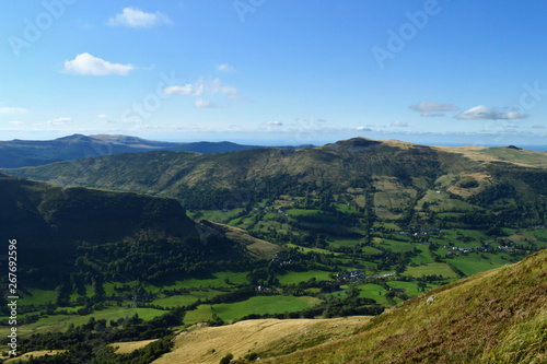 A magnificent panorama and viewpoint from the mountain range of Cantal in Auvergne, France. National Park of the Auvergne volcano