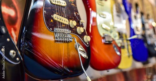 фотографія guitars lined in a row