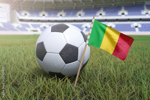 Mali flag in stadium field with soccer football