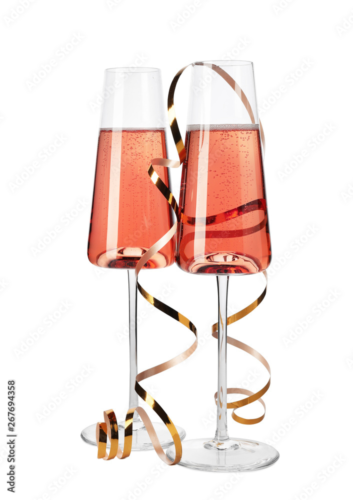 Glasses of rose champagne with gold streamer isolated on white Stock Photo Adobe Stock