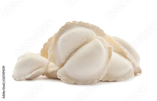 Heap of raw dumplings on white background