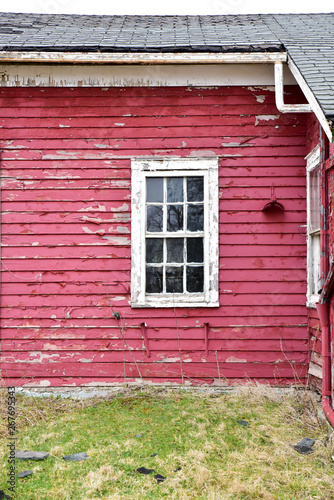 abandoned weathered wood farmhouse