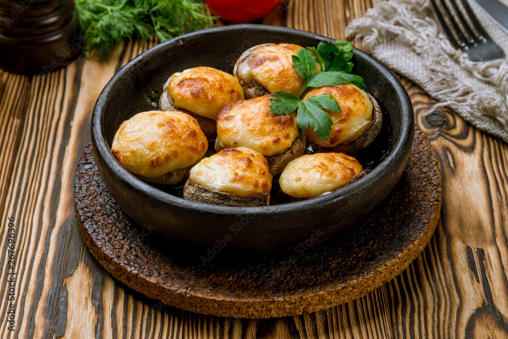 mushrooms baked with Suluguni cheese mushrooms baked with Suluguni cheese