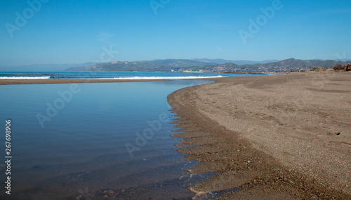 Sandbar where the Pacific ocean and the Santa Clara river meet at Surfers Knoll beach in Ventura California United States