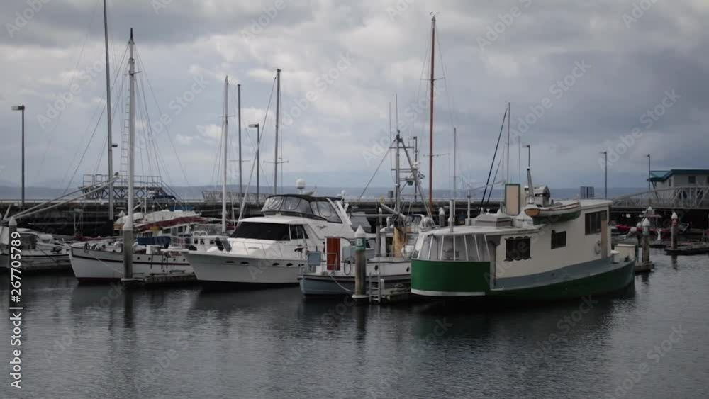 Slow motion sail boats in bay in Seattle