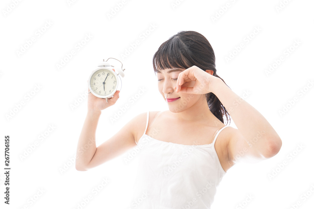 早起きをする若い女性 早起きをする若い女性