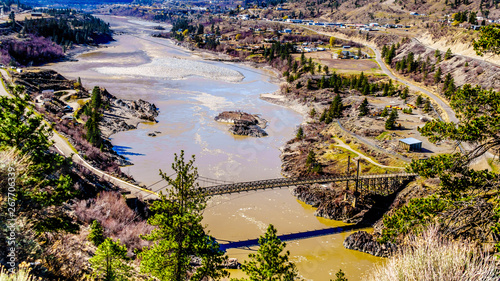 View of The Old Bridge, a single lane bridge over the Fraser River at the town just north of the town of Lillooet, British Columbia, Canada