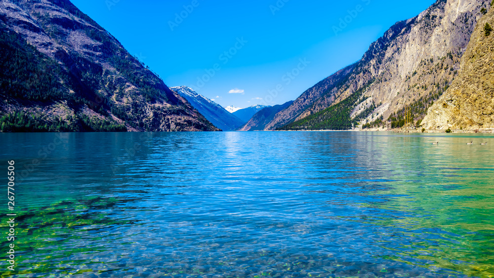 The clean green water of Seton Lake on the foot of Mount McLean near Lillooet. Seton Lake is located along Highway 99, the Duffey Lake Road, between Pemberton and Lillooet in southern British Columbia The clean green water of Seton Lake on the foot of Mount McLean near Lillooet. Seton Lake is located along Highway 99, the Duffey Lake Road, between Pemberton and Lillooet in southern British Columbia