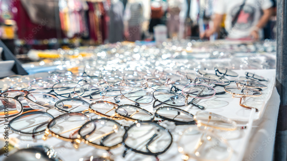 Close up focus panel fashion glasses in Asian night market