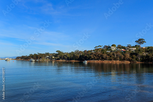 Coles Bay Tasmania with beautiful blue water © Chris Ison