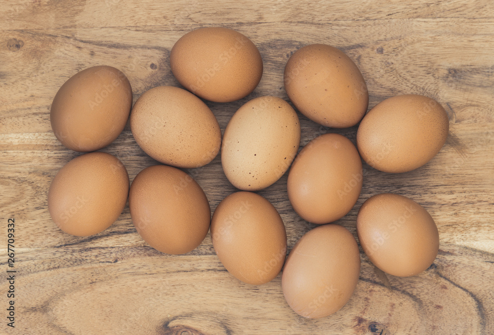 Eggs having a party on a wooden table Eggs having a party on a wooden table