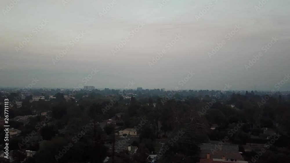 This is a smokey wildfire drone shot of a Los Angeles Valley during the Malibu Wild fires. This is a smokey wildfire drone shot of a Los Angeles Valley during the Malibu Wild fires.