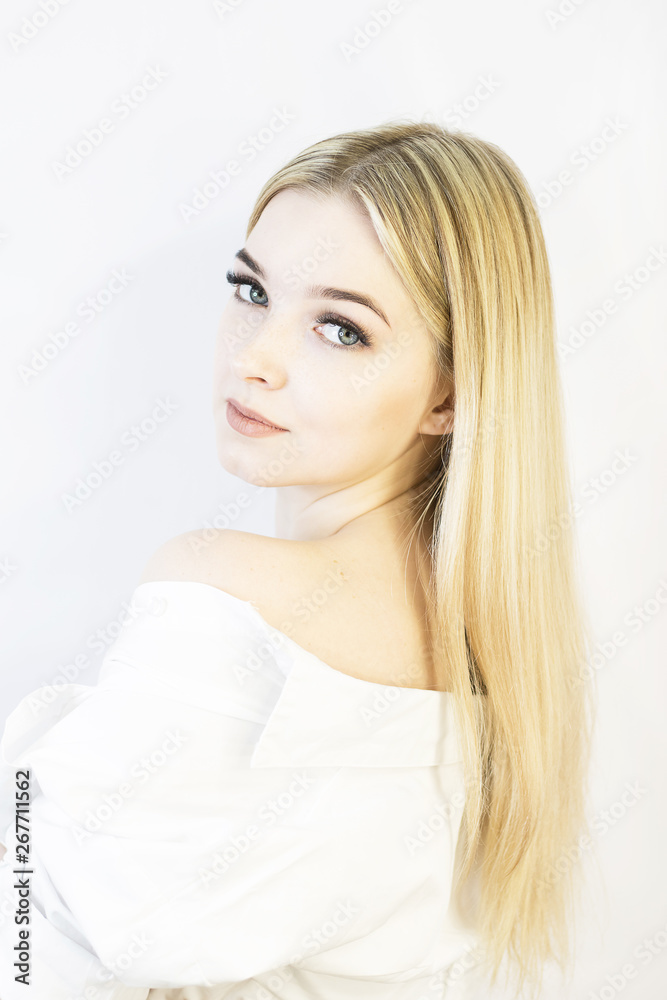 The girl's face is a blonde. Close-up. Facial care The girl's face is a blonde. Close-up. Facial care