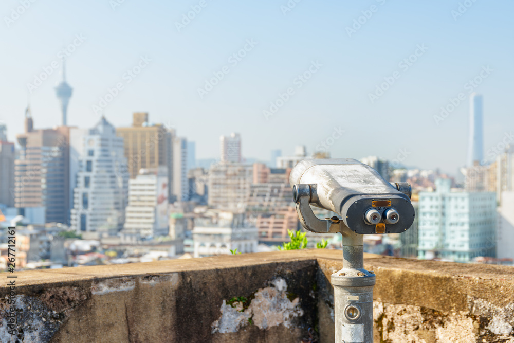 Old shabby tower viewer at observation deck in Macau
