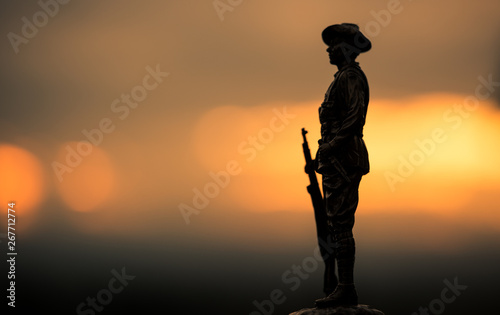 Soldier figure silhouette at sunrise, Anzac Day.