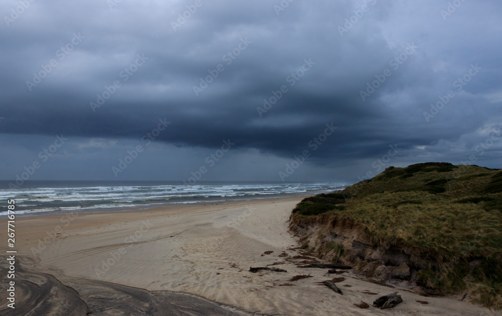 Dark storm clouds over Ocean Beach Tasmania
