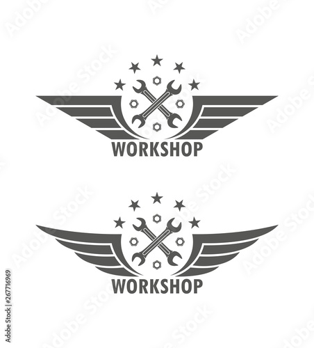 Black and white illustration of a workshop logo. Crossed keys wings of a star and text