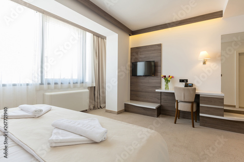 Interior of a modern double bed hotel bedroom © rilueda