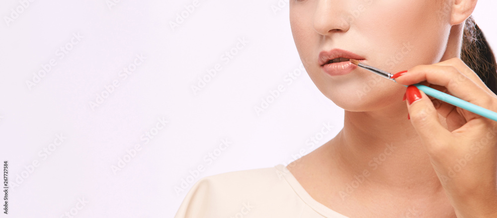 Woman make makeup. Face cosmetic. Skin care. Facial hightlighter. Mascara Woman make makeup. Face cosmetic. Skin care. Facial hightlighter. Mascara