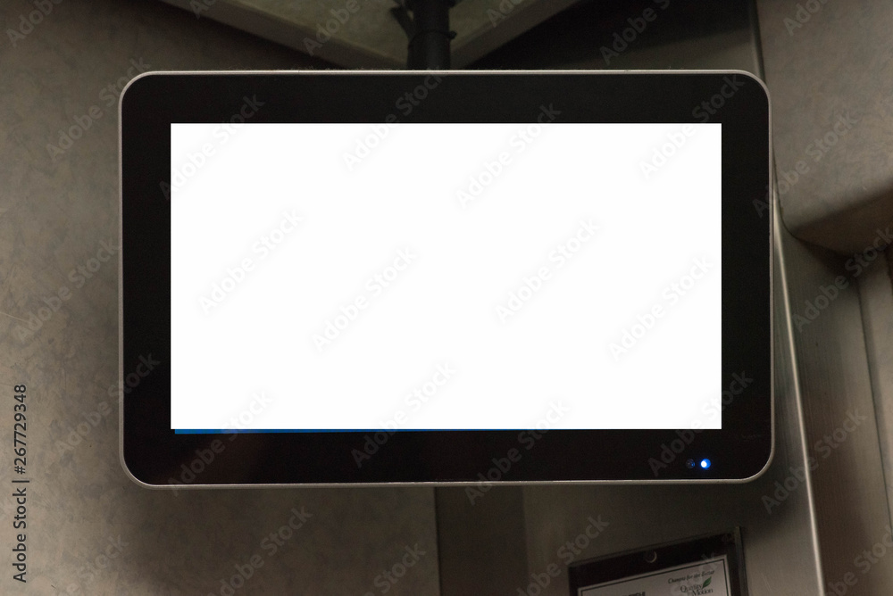 TV screen in elevator.
