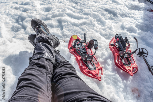 foot with boots in snowshoes photo