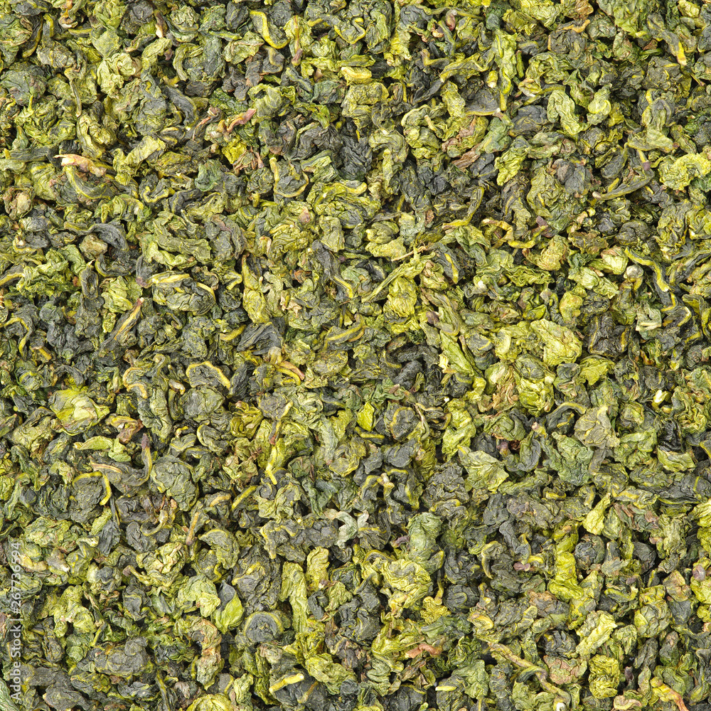 Dry green oolong tea leaves texture background Dry green oolong tea leaves texture background