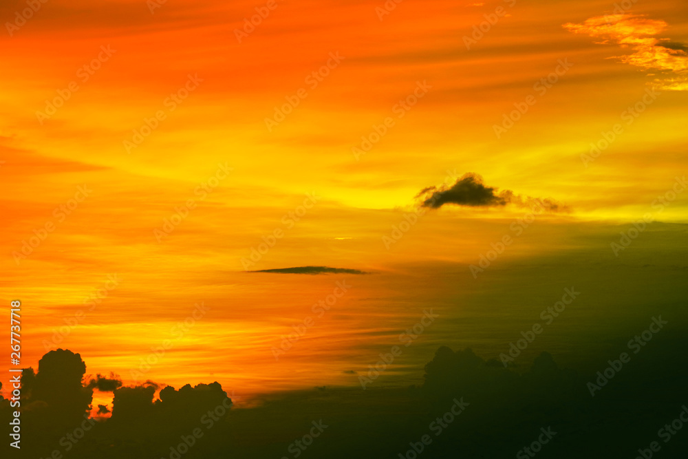 colorful heap dark orange sunset cloud and sun on sky