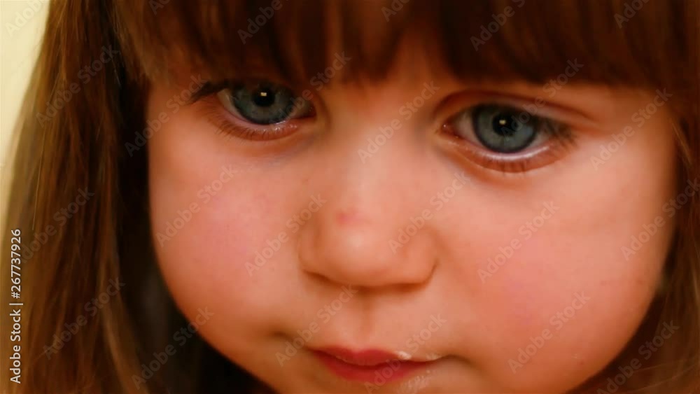 Little beautiful girl, baby infante, Caucasian. looks with his big blue eyes and smiles. Long blonde hair in a two year old child. Smile of an infant. 4k Little beautiful girl, baby infante, Caucasian. looks with his big blue eyes and smiles. Long blonde hair in a two year old child. Smile of an infant. 4k