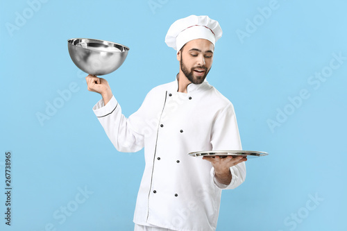 Handsome male chef with emp...