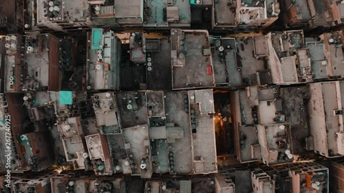 India, Delhi city center slums roofs aerial 4k drone footage, evening dusk