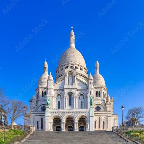  Paris, basilica Sacre-Coeur, touristic monument in blue sky 