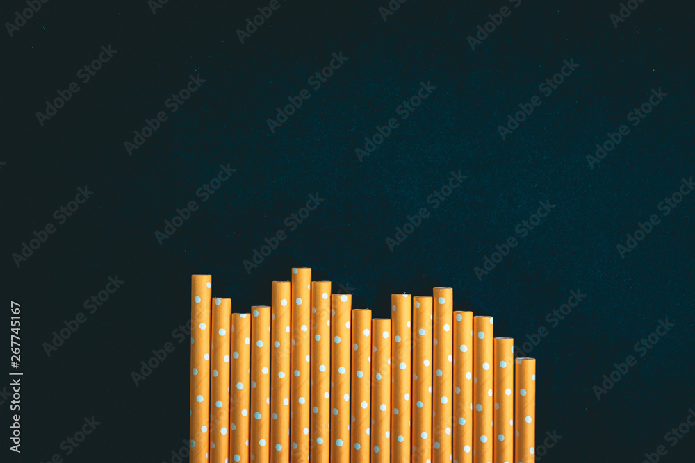 Yellow paper straws background Yellow paper straws background