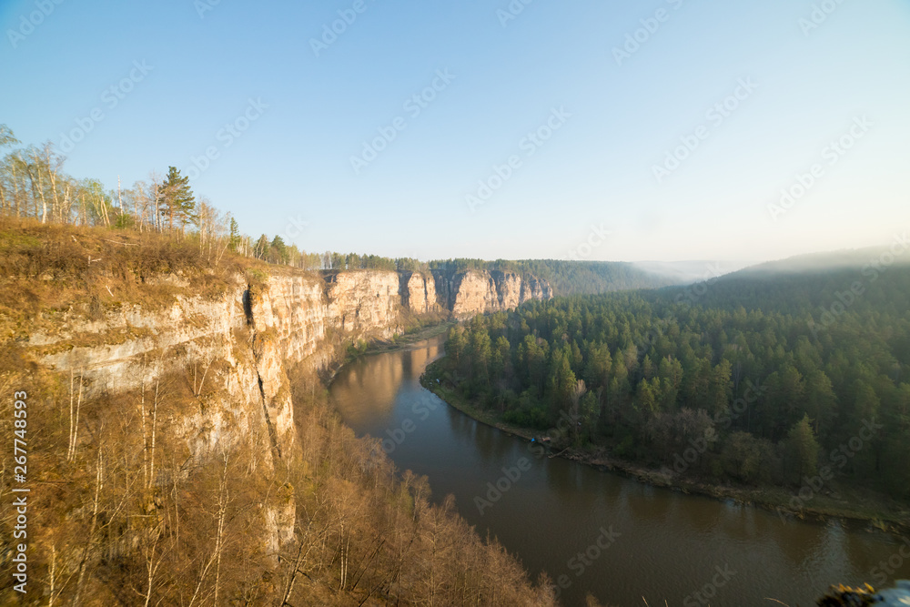 River in the forest and cliffs edge