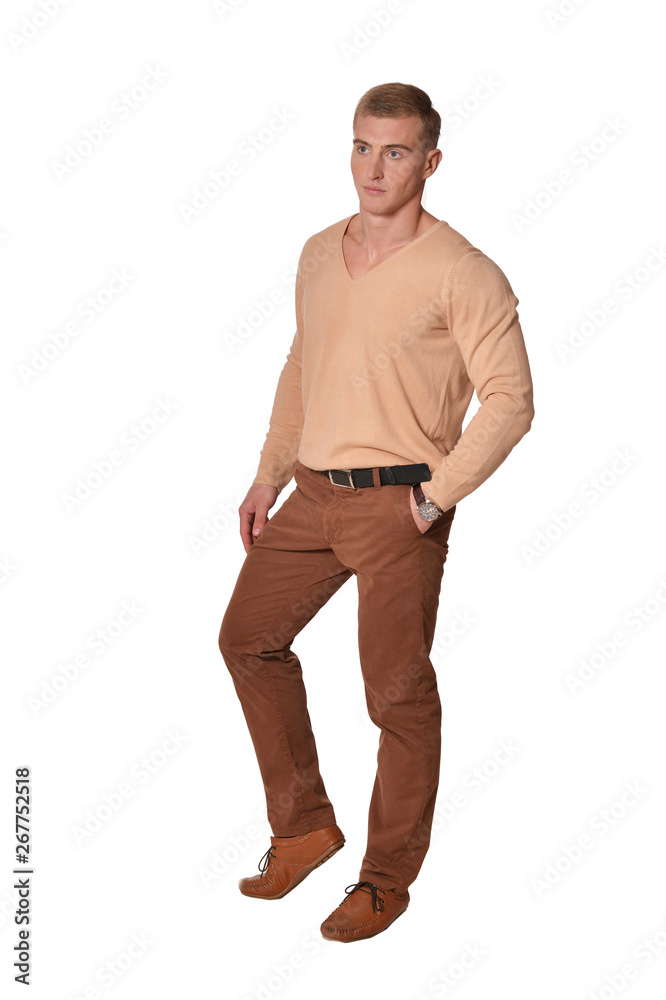 Handsome young man wearing casual clothing posing on white background Handsome young man wearing casual clothing posing on white background