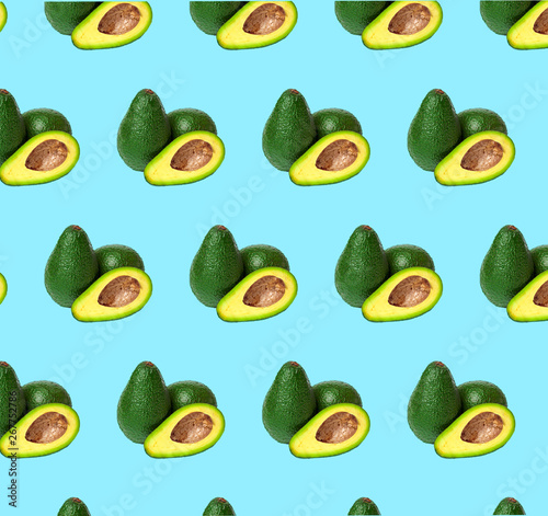 Avocado pattern on color background. Top view. Banner. Pop art design, creative summer food concept