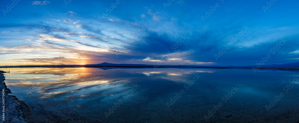 Fototapeta premium Sunset huge panorama with cloudscape at Chaxa lagoon, Atacama