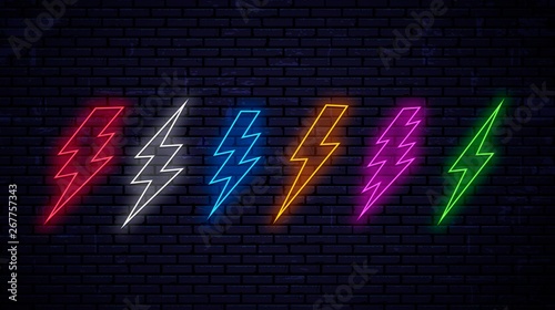 Set of multicolored bright neon lightnings isolated on wall background. Neon lightning red, white, blue, yellow, pink, green color. Vector sign of electricity, energy, thunder, power, danger, warning.